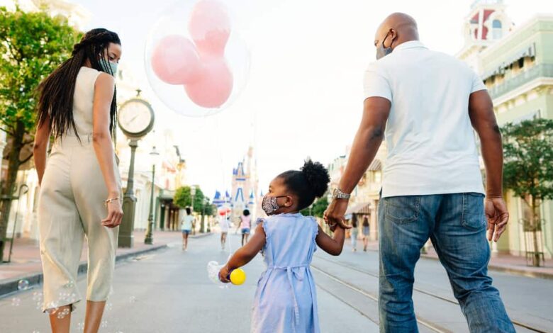 Guests walking down Main Street, U.S.A.