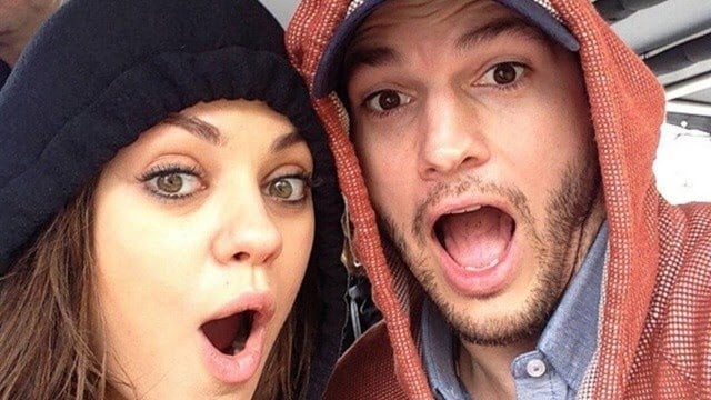 Ashton kutcher and mila kunis at Disney