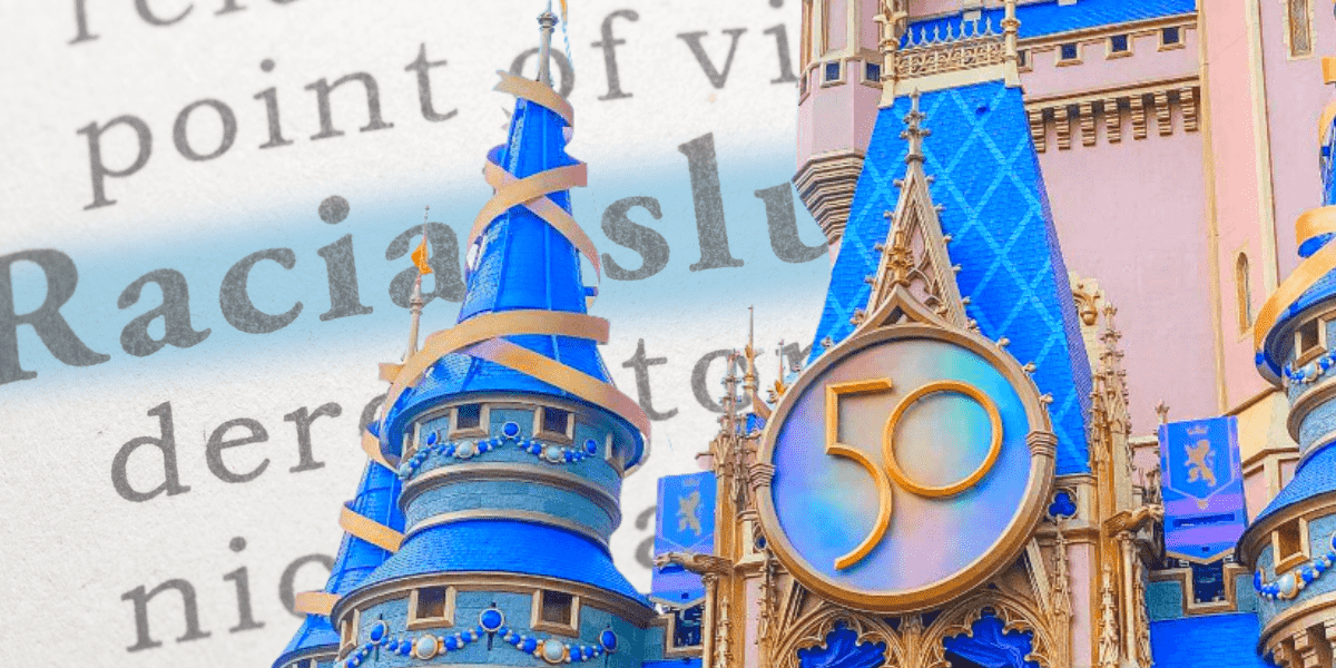 cinderella castle with dictionary page open to racial slur