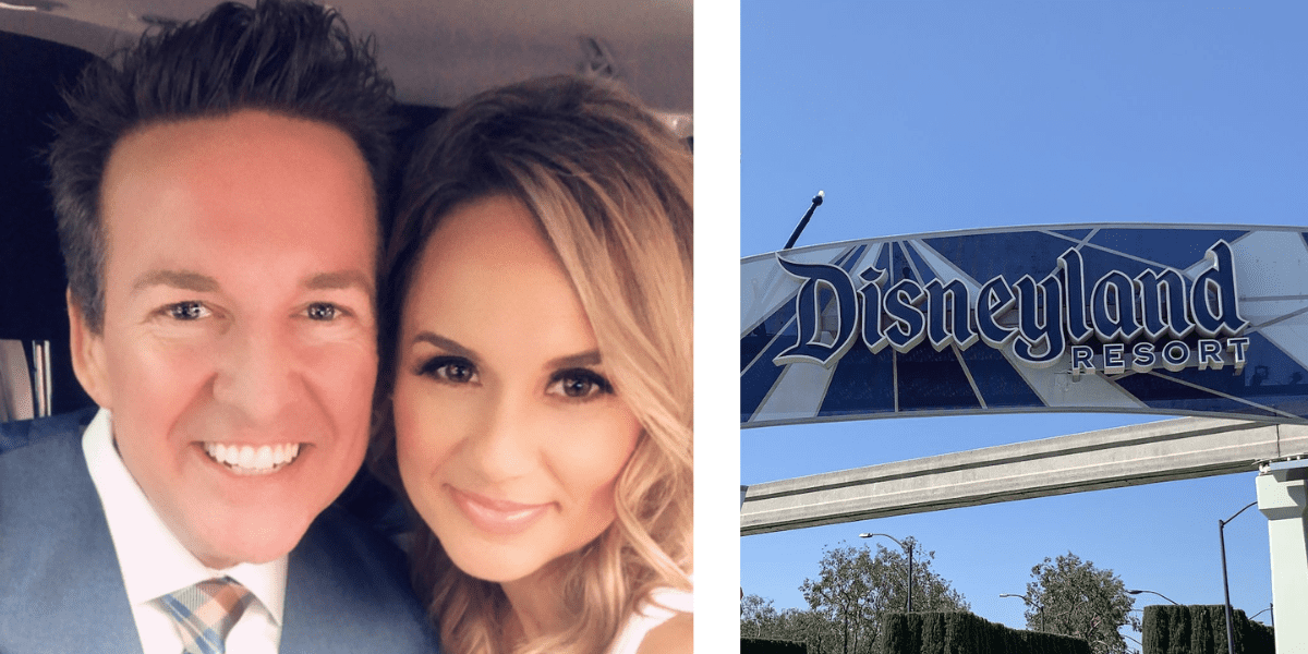 married couple and disneyland sign