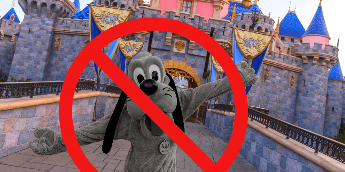 pluto black and white against colorful castle