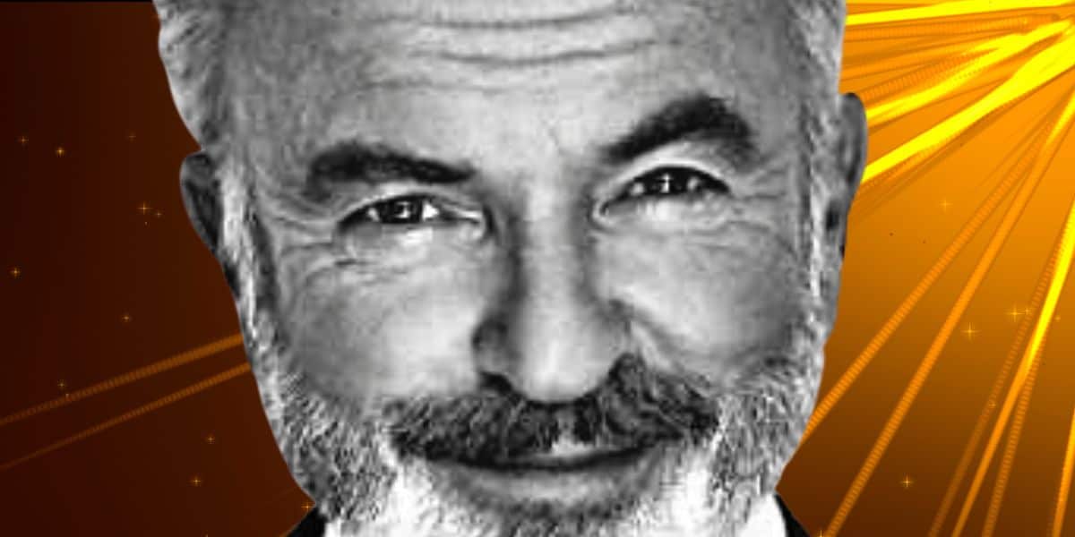 sam neill black and white photo with yellow sunburst background