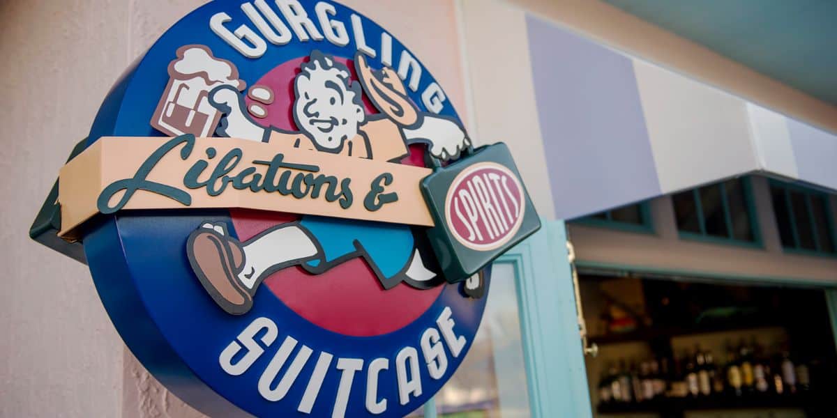 Gurgling Suitcase Libations and Spirits Sign