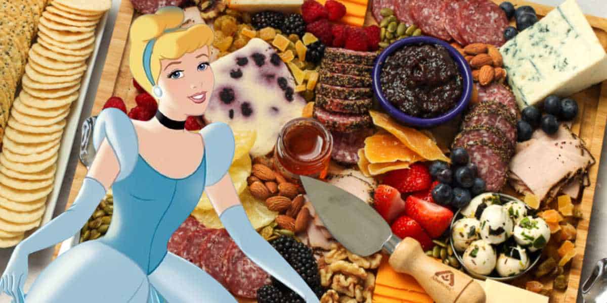 A colorful charcuterie board fit for a royal feast, filled with assorted cheeses, meats, fruits, nuts, and spreads. A cartoon princess in a blue dress smiles and poses in the foreground. The board includes items like crackers, berries, herbs, and sliced bread.