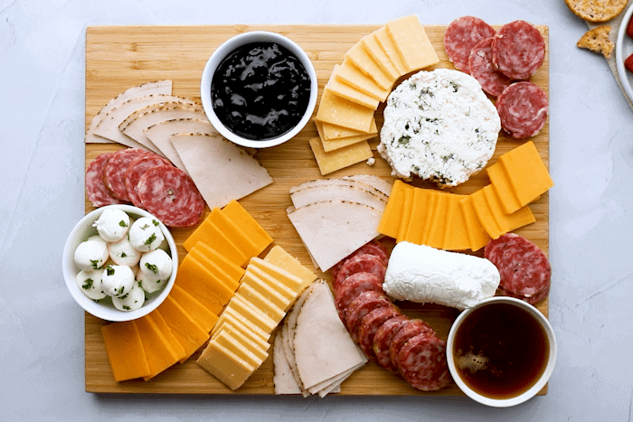 Honey and fruit preserves added to the Charcuterie Board.