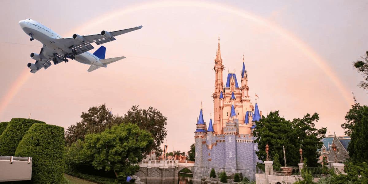 Cinderella Castle at Disney World with a plane flying.