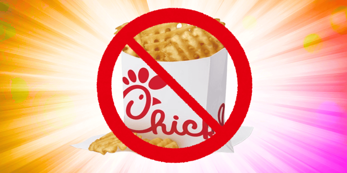 Image of a cup containing waffle fries from Chick-fil-A, overlaid with a large red prohibition symbol, hinting at the shocking news: Chick-fil-A getting rid of waffle fries. The background is a colorful burst of light rays.