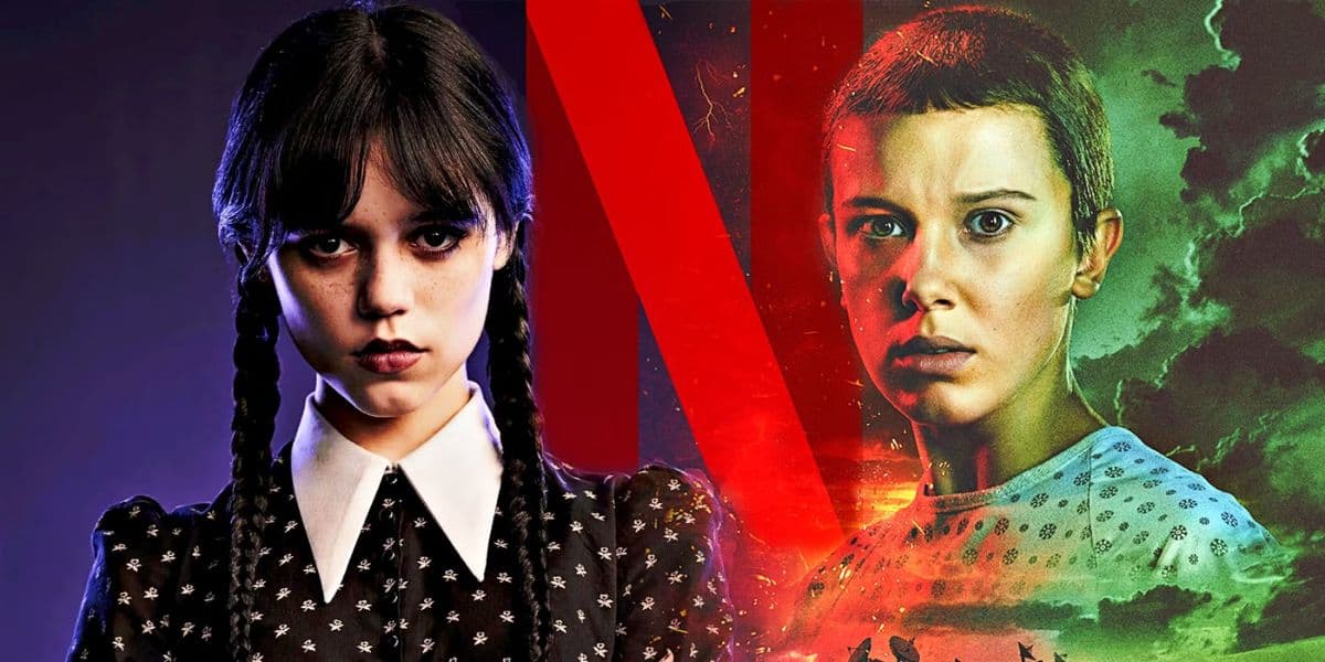 A girl with long black pigtails wears a black dress with a white collar on the left, beside a girl with short hair in a patterned shirt. A red "N" logo is in the background, symbolizing Netflix.