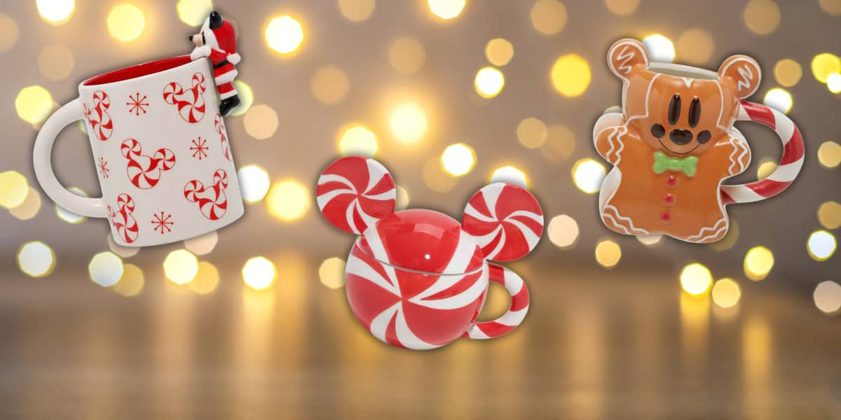 Festive holiday mugs with a Disney theme against a bokeh background: a Santa-themed peppermint mug, a Mickey Mouse peppermint mug, and a gingerbread-themed mug with Mickey Mouse features.