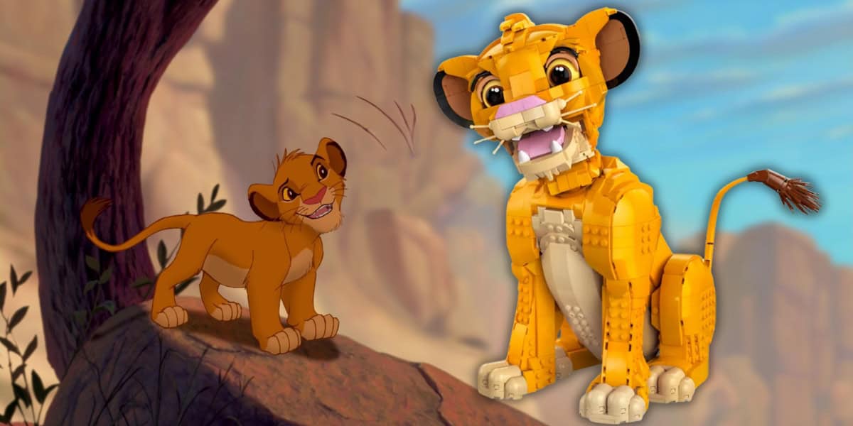 An animated young lion cub curiously looks up at a large, detailed Lego model of a lion cub against a backdrop of a rocky landscape and blue sky.