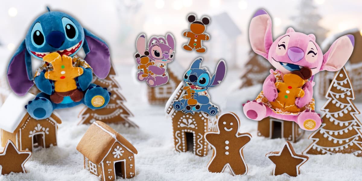 Plush toys of Stitch and Angel sit amidst gingerbread houses and cookies in a snowy setting. They hold gingerbread cookies shaped like people and mice. The whimsical scene evokes a festive, winter holiday atmosphere.