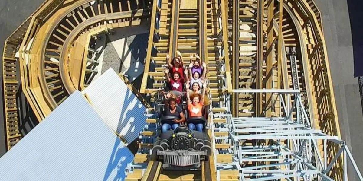 A group of people riding Switchback at ZDT's Amusement Park.