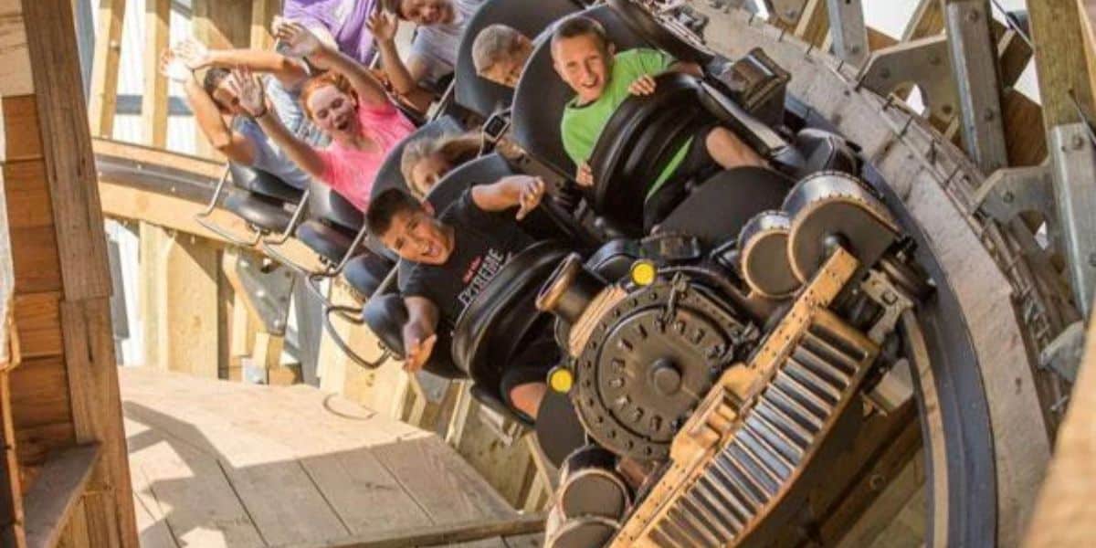 A group of people enjoy Switchback at ZDT's Amusement Park.