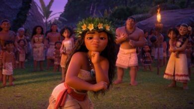 Moana wears a flower crown in Moana 2
