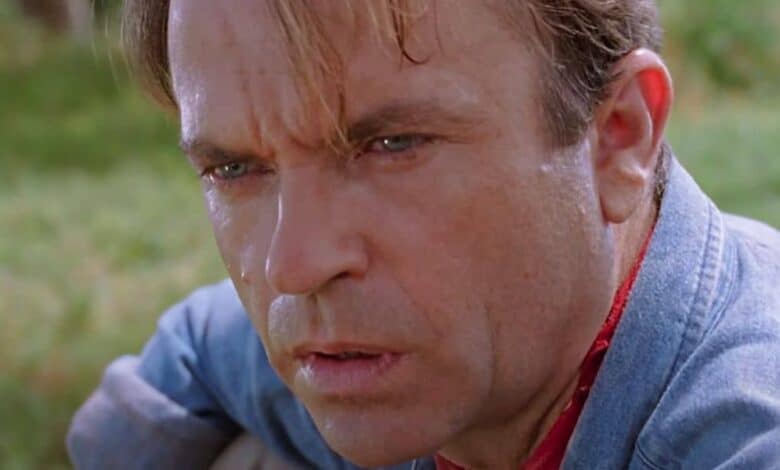 Alan Grant (Sam Neill) staring at the dinosaurs in disbelief in 'Jurassic Park' (1993)
