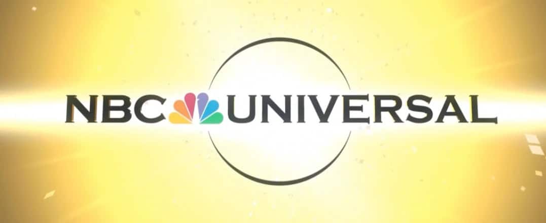 NBCUniversal logo featuring its colorful peacock design on a bright yellow background, reflecting its commitment to a vibrant and inclusive culture amid ongoing DEI investigations.