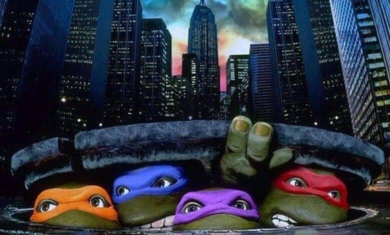 'Teenage Mutant Ninja Turtles' (1990) official poster - turtles lifting the manhole cover