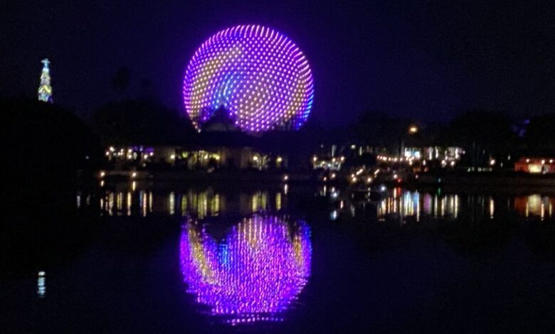 Spaceship Earth as seen from the EPCOT World Showcase at night.