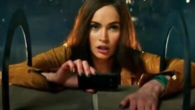 Megan Fox as April O'Neil spying on the Turtles in 'Teenage Mutant Ninja Turtles' (2014)