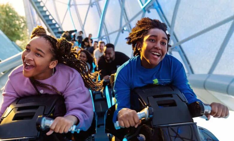 guests ride TRON Lightcycle/Run in Disney World's Magic Kingdom park