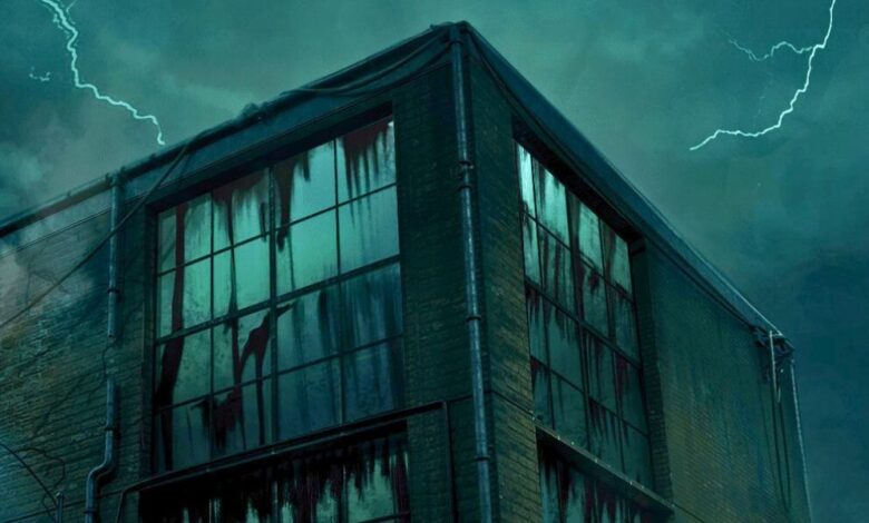 A dark, abandoned building with cracked windows and streaks of grime stands under a stormy night sky, illuminated by lightning bolts in the background as Universal Chicago prepares for Horror Unleashed.