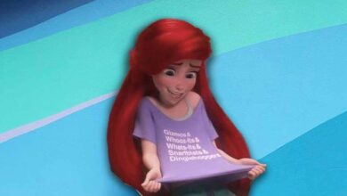 Animated character with long red hair smiles and looks down at her purple shirt, which has white text that reads: "Gizmos & Whoz-its & Whatz-its & Snarfblats & Dinglehoppers." Blue background with wavy lines.