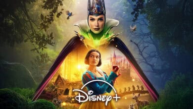 A young woman dressed as Snow White holds a red apple, with an evil queen looming above her. In the background are dwarfs, a castle, and a forest. The Disney+ logo hints at the Snow White release on Disney+.