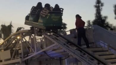 A Disney cast member readying to evacuate guests from Goofy's Sky School