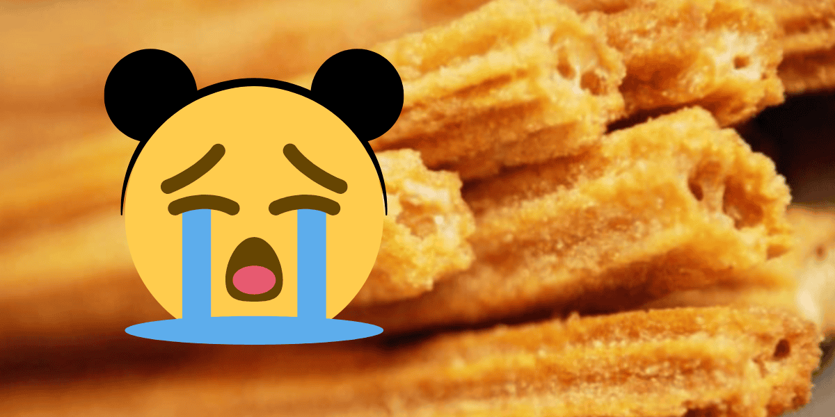 A large crying face emoji with bear ears overlays a close-up of several golden-brown churros, partially covering the churros' textured surface.