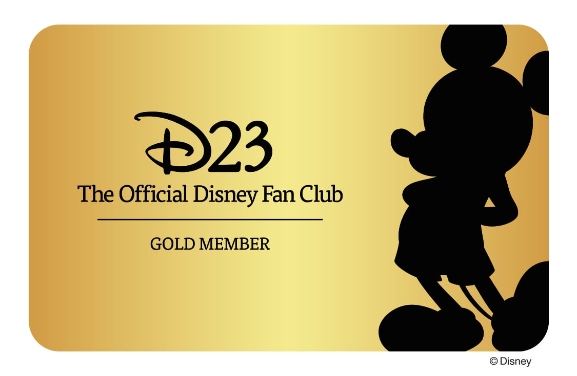 A gold D23 Disney Fan Club card displays the D23 logo, "The Official Disney Fan Club," "Gold Member," and a black silhouette of Mickey Mouse, perfect for showcasing your Disney Plus D23 membership.
