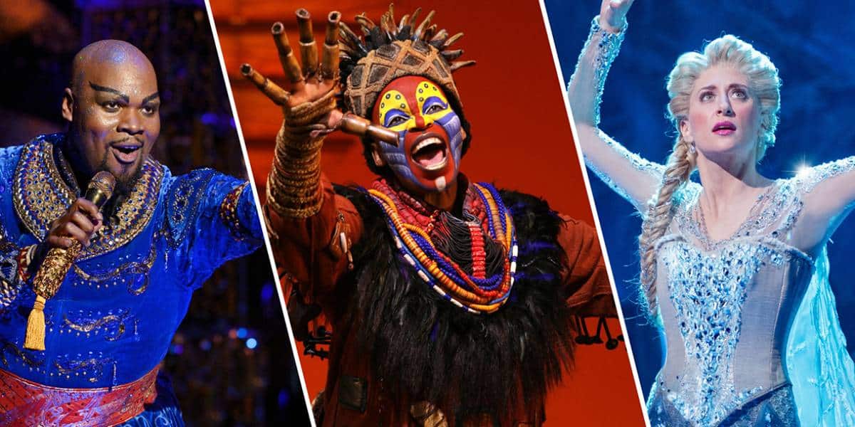 Three Broadway actors in costume: one as a genie in blue with gold accents, one as Rafiki in traditional African attire and face paint, and one as Elsa in a sparkling blue dress with icy makeup.