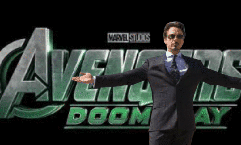 A man in a suit with sunglasses stands with arms outstretched in front of a "Marvel Studios Avengers: Doomsday" logo on a black background.
