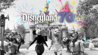 A black-and-white photo of Disneyland’s Sleeping Beauty Castle with vintage costumed characters, overlaid with colorful fireworks, "Disneyland Resort," and a "70" logo celebrating its 70th anniversary.