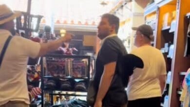 A screenshot from a video of a fight over splashing water at Walt Disney World Resort.