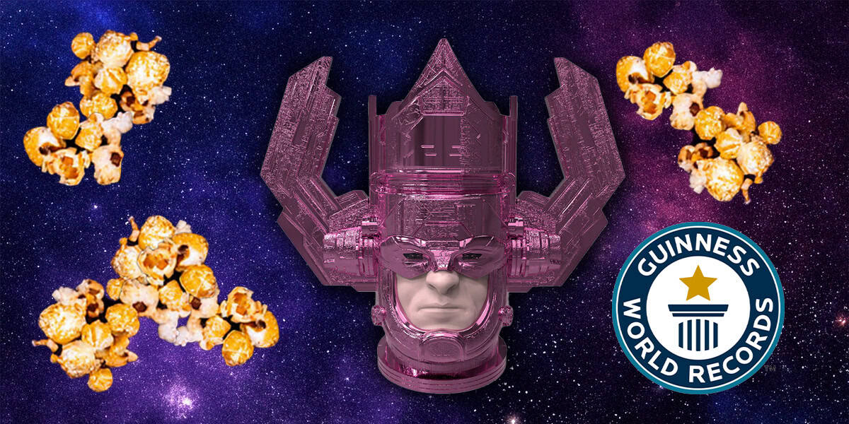 A large purple robotic head floats in a starry galaxy background, surrounded by clusters of caramel popcorn. A Guinness World Records logo appears in the lower right corner.