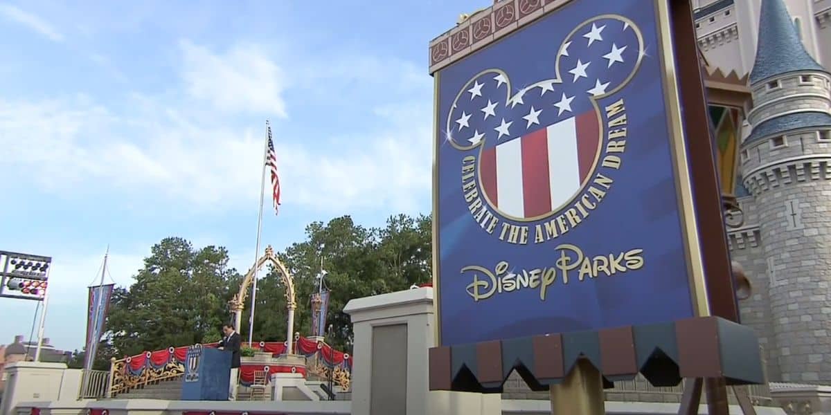 A sign at Disney Parks reads "Celebrate the American Dream" as thousands of immigrants take the Oath of US Citizenship at Walt Disney World Resort on July 4, 2007.