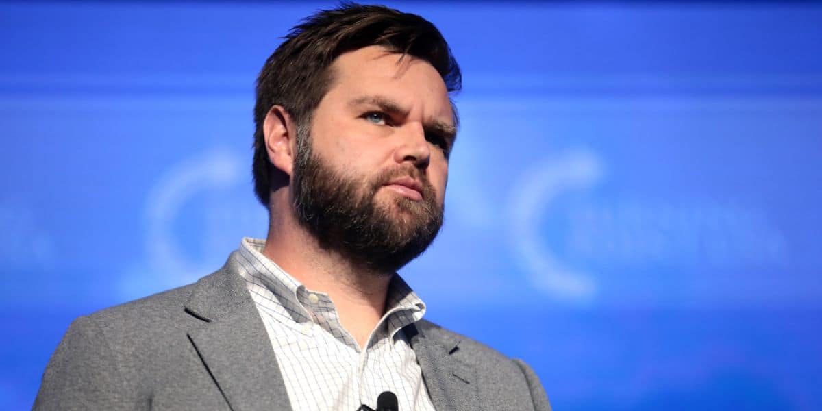 JD Vance on stage at a conference.