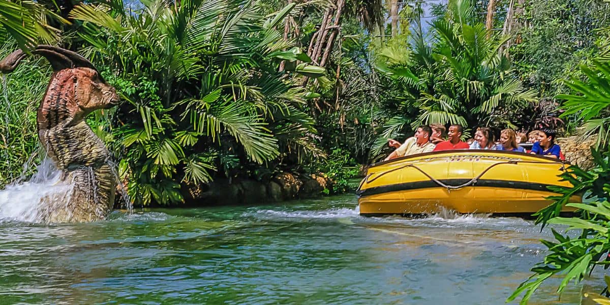 A group of people ride Jurassic Park River Adventure at Universal Orlando Resort.