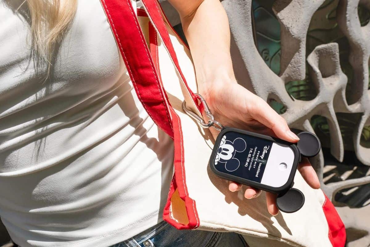 A person wearing the Mickey Mouse Touchland hand sanitizer