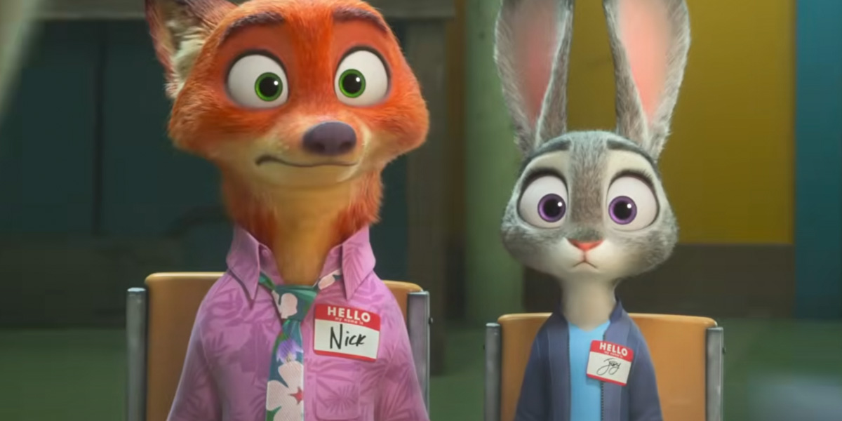 A cartoon fox in a pink shirt and a rabbit in blue sit side by side, both wide-eyed, wearing name tags: "Nick" and "Judy." It's a scene that feels straight out of the Zootopia 2 trailer.