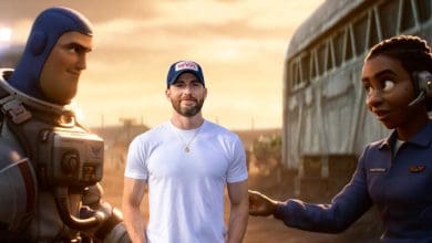 Chris Evans stands in front of a scene from Lightyear