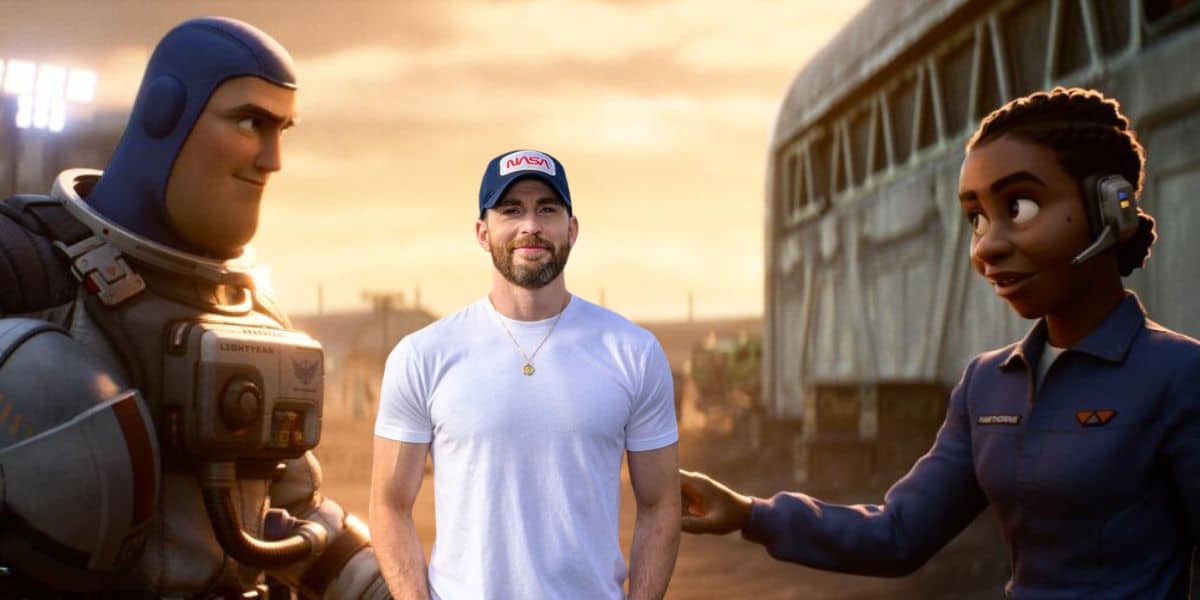 Chris Evans stands in front of a scene from Lightyear