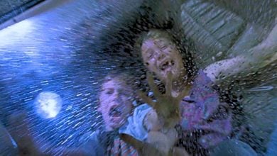 Lex and Tim behind the glass during the T-Rex attack in 'Jurassic Park'