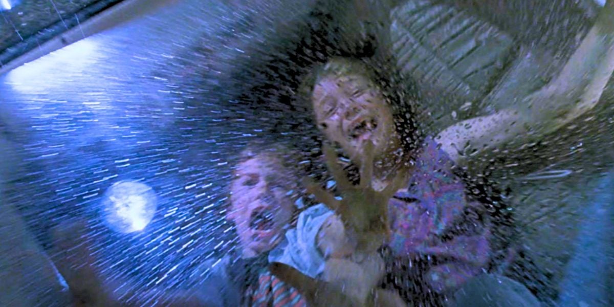 Lex and Tim behind the glass during the T-Rex attack in 'Jurassic Park'