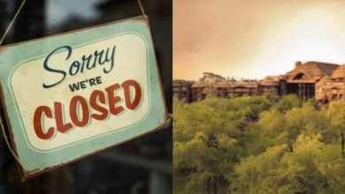 A vintage "Sorry We're Closed" sign hangs on a door next to an image of a large, rustic building surrounded by green trees under a cloudy sky.