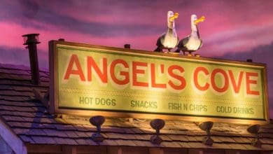 Two Disney animatronic seagull characters in the queue for Crush's Coaster