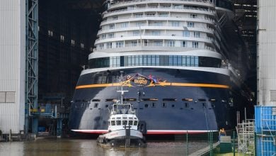 Disney Cruise Line ship sailing on the water.
