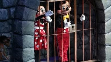 Mickey and Minnie Mouse in jail during a Disney on Ice show.