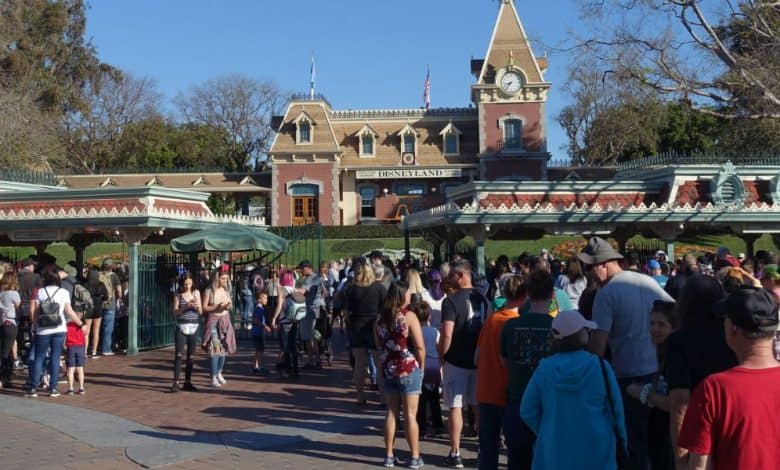 People waiting outside the entrance to Disneyland Park in Anaheim, California.