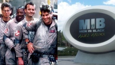 On the left, four men in Ghostbusters uniforms stand together smiling. On the right, a large sign reads "MIB Men In Black Alien Attack" at an outdoor location.